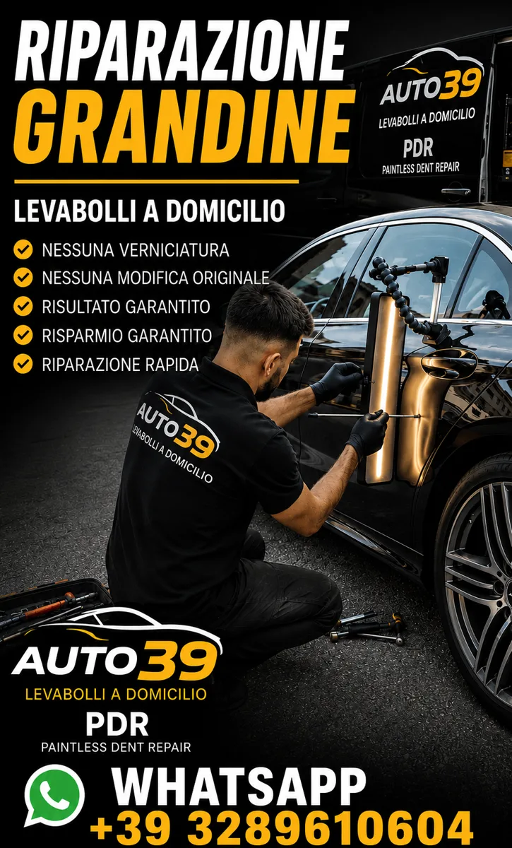 Ammaccature da grandine: come toglierle con il PDR Tecnico al lavoro con lampada PDR su fiancata nera: come togliere ammaccature da grandine senza verniciatura